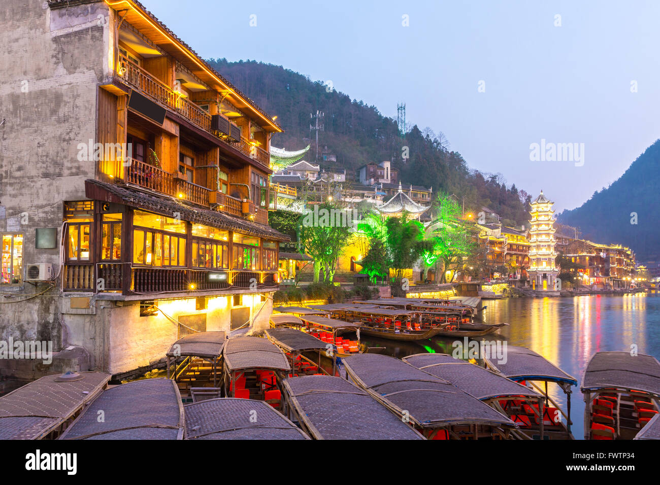 Fenghuang (Phoenix) ancient town sunset duak, Hunan province, China ...