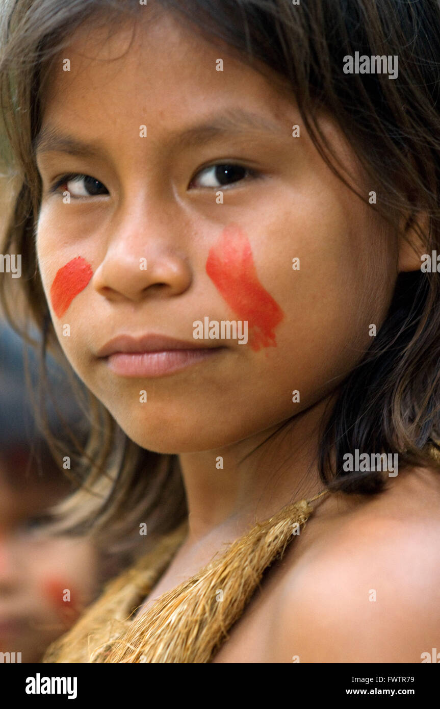 Yagua tribe located near Iquitos, Amazonian, Peru. Young girl poses ...