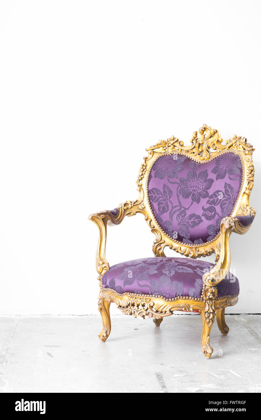 Royal Purple classical style Armchair sofa couch in vintage room Stock ...