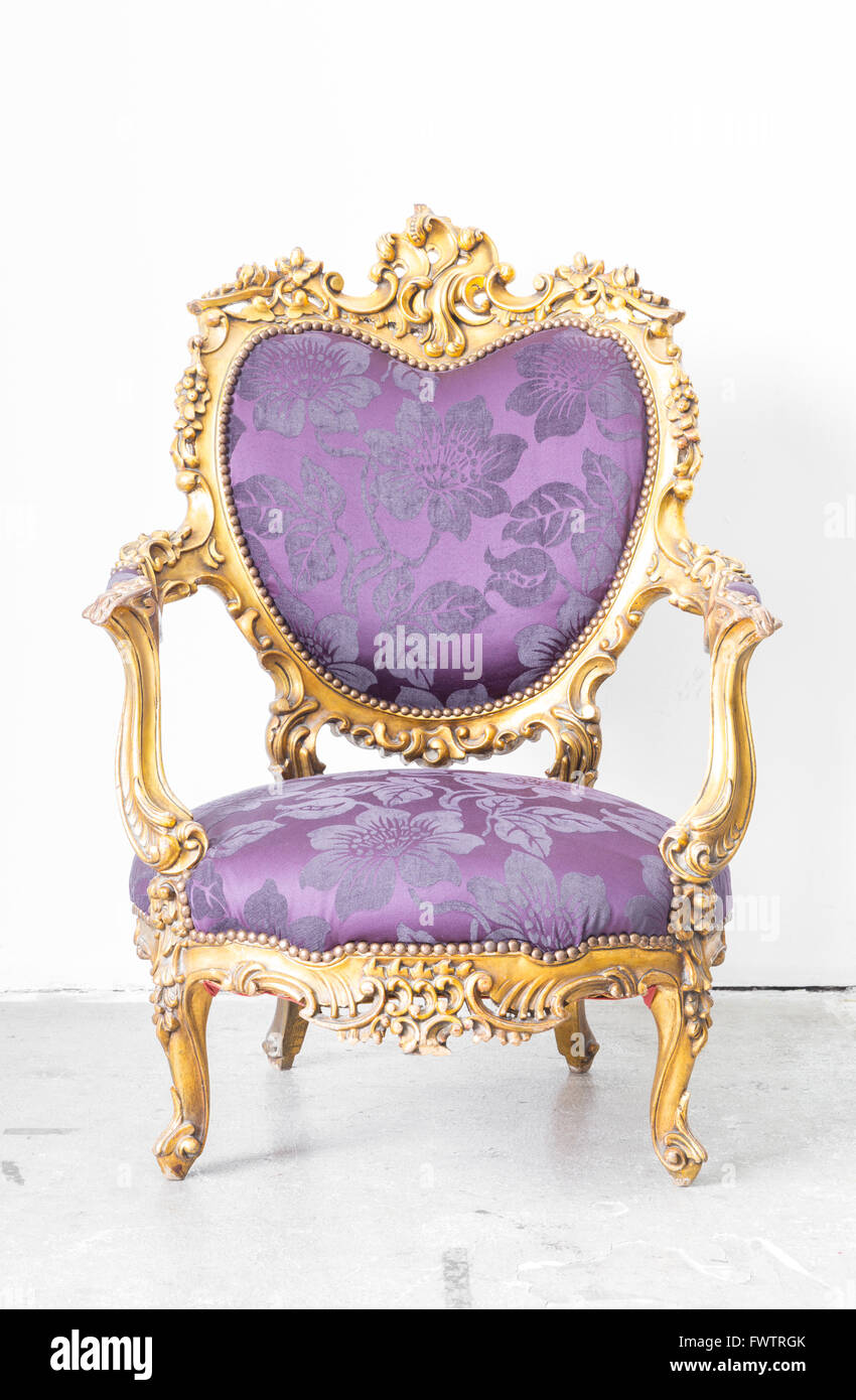 Royal Purple classical style Armchair sofa couch in vintage room Stock ...