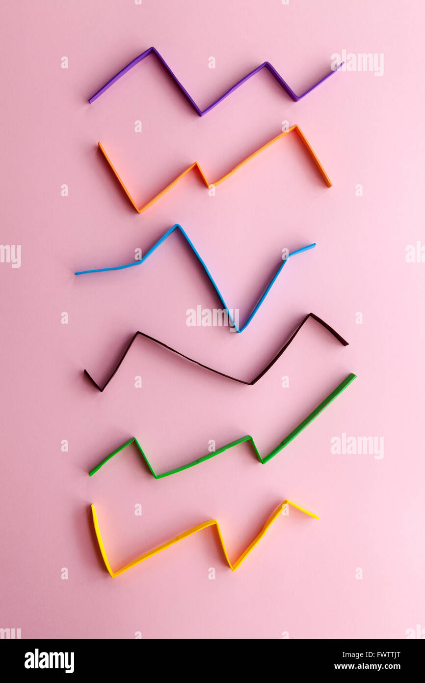 Creative colorful chart on a pink background Stock Photo - Alamy