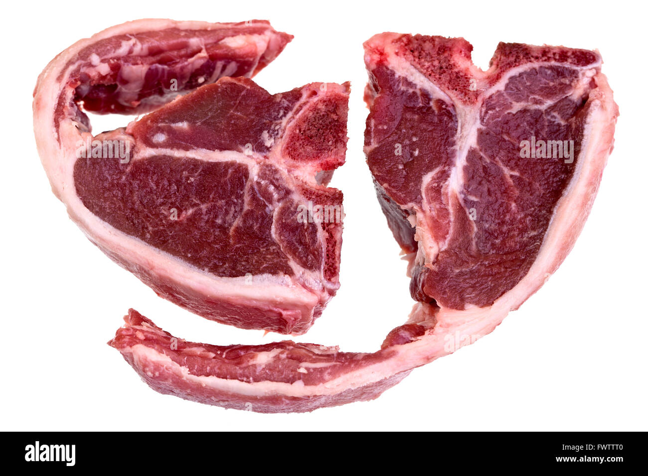 Raw lamb loin chops with fat around the meat isolated over white background Stock Photo