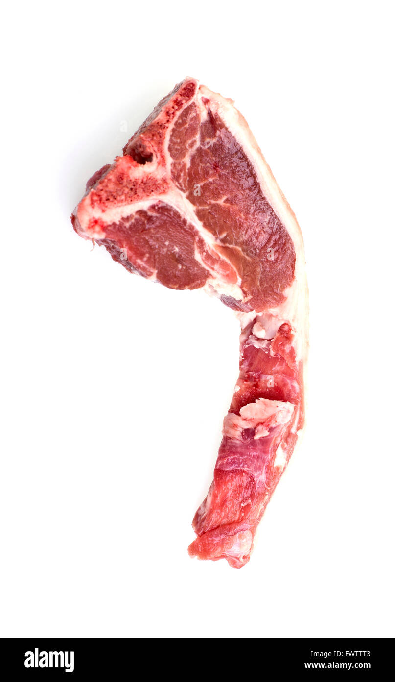 Single raw lamb loin chop with fat around the meat isolated over white background. Stock Photo