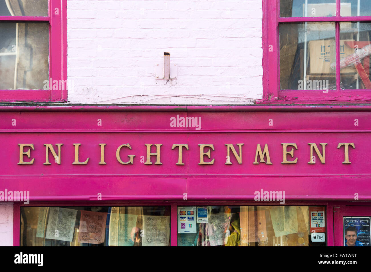 Enlightenment shop front in the high street. Glastonbury, Somerset, England Stock Photo