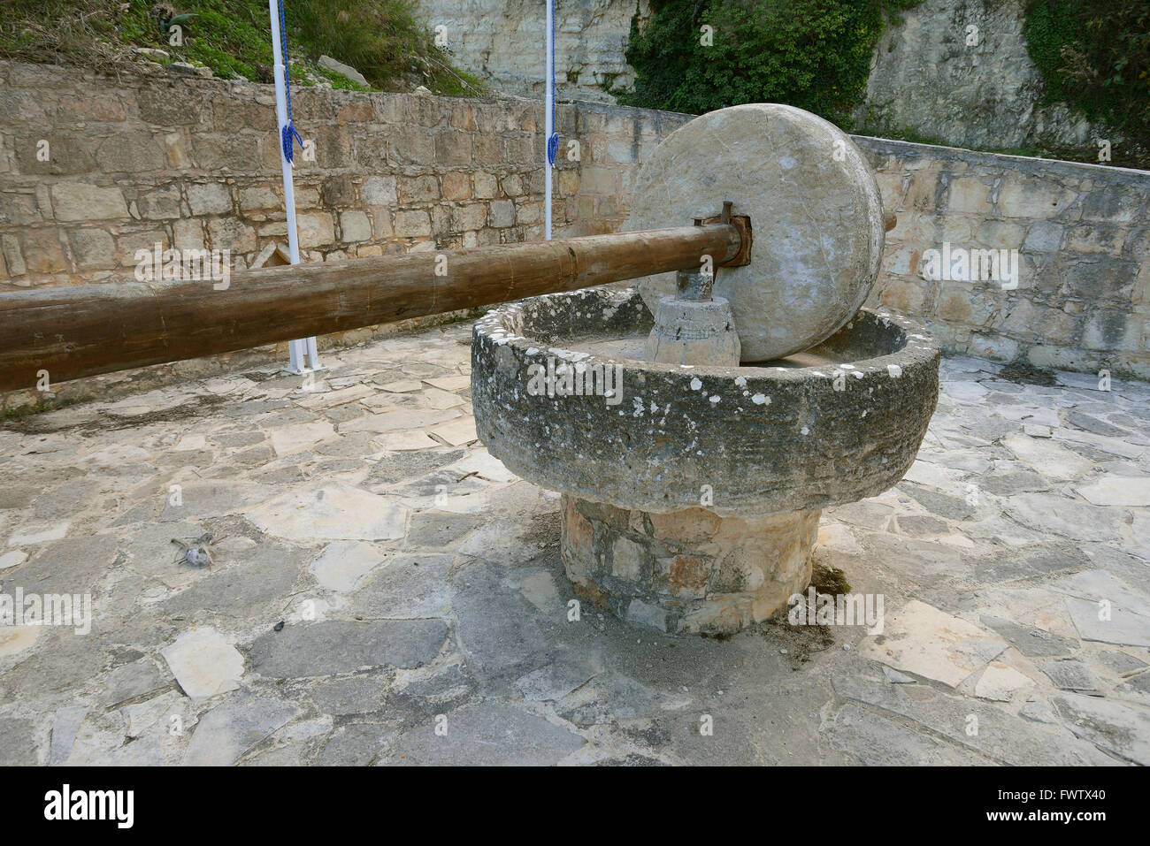 Old Olive Press with Stone Roller Kritou Terra, Cyprus Stock Photo