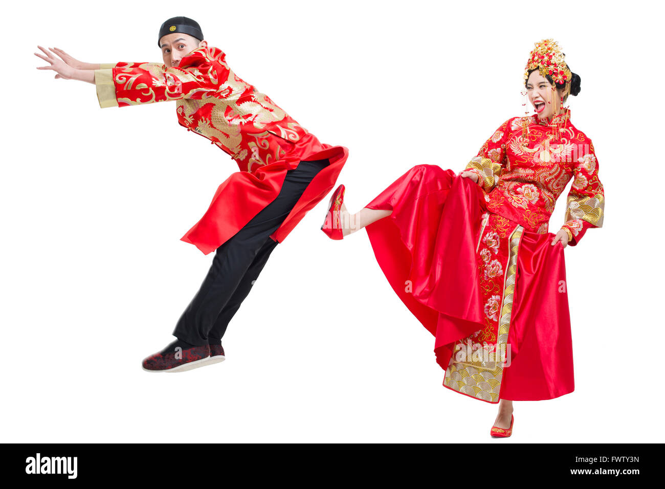 Wife kicking husband Cut Out Stock Images & Pictures Alamy