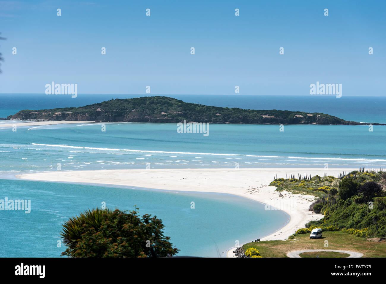 island and white beach in New Zealand Stock Photo