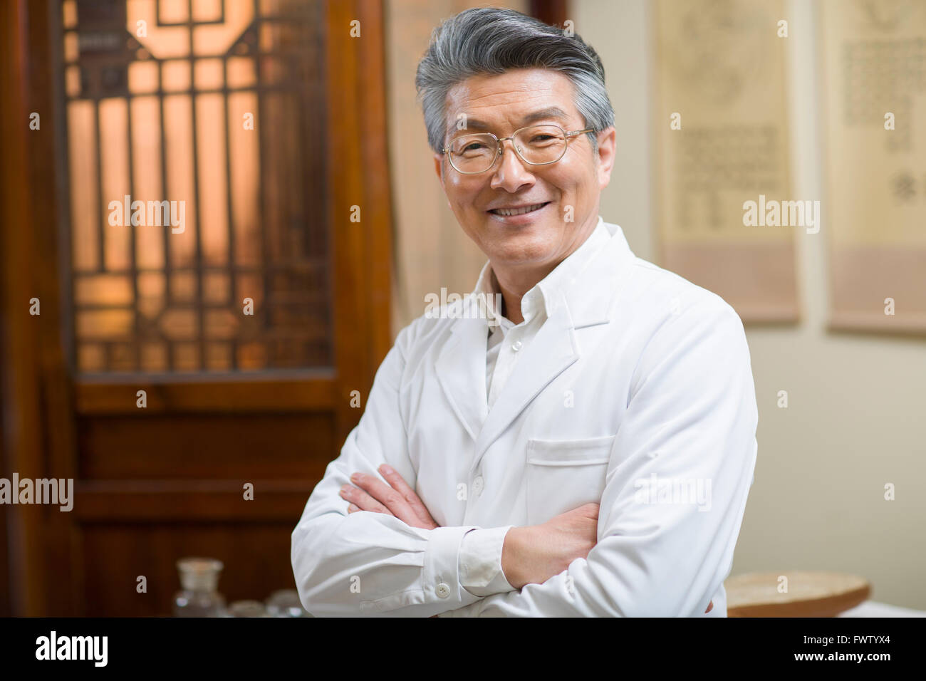 Portrait of senior Chinese doctor Stock Photo - Alamy