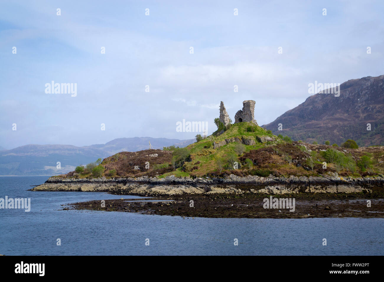 Stone ruins by the ocean near the Isle of Skye in the Scottish highlands Stock Photo