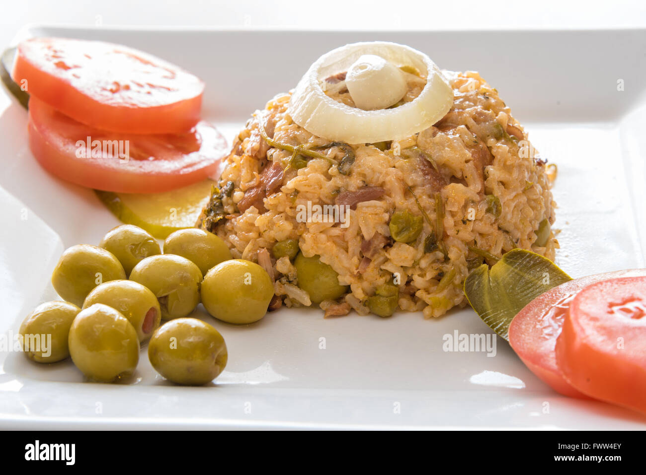 Cuban cuisine traditional creole yellow rice garnished with olives
