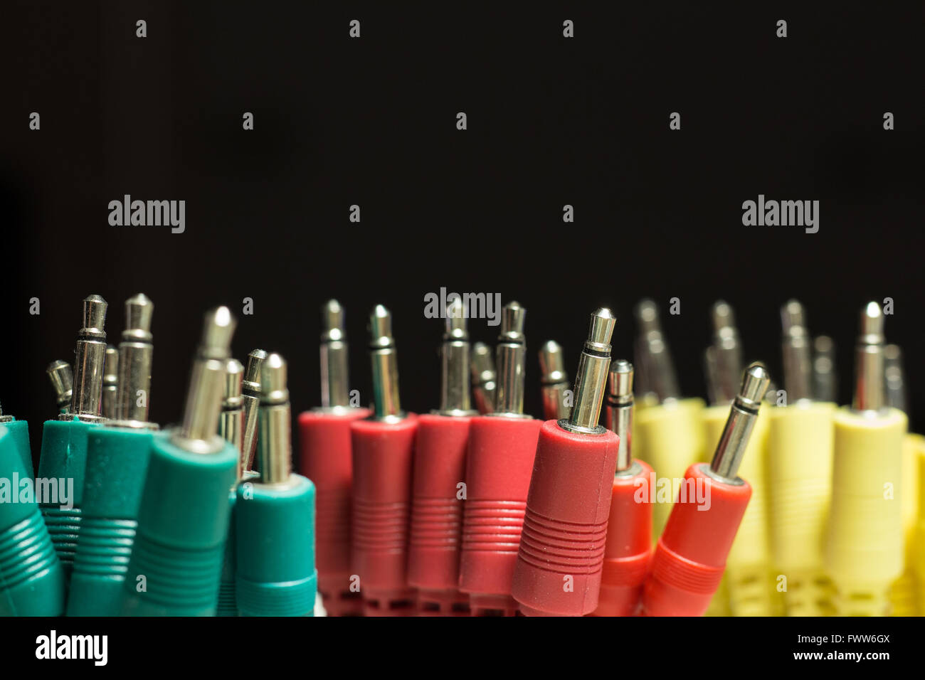 colorful audio cables macro on black background Stock Photo