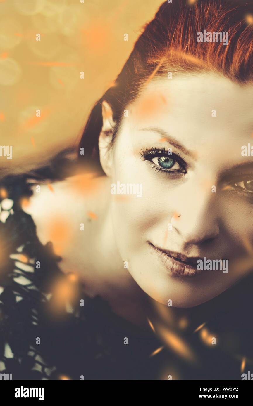 portrait of the beautiful woman with falling leaves Stock Photo