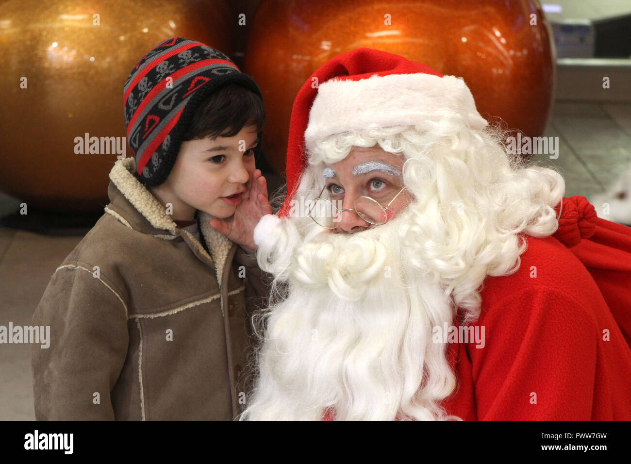 Boy meeting Santa Clause   Pic Peter Devlin Stock Photo