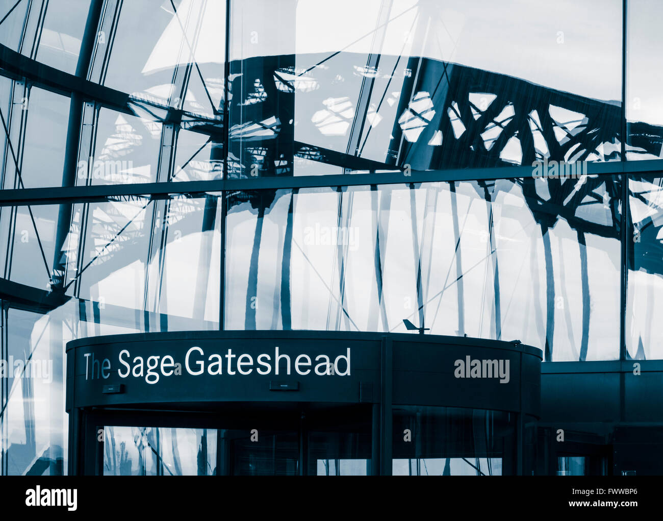The Tyne Bridge reflected in The Sage Gateshead building. Gateshead, Tyne and Wear, England, UK Stock Photo