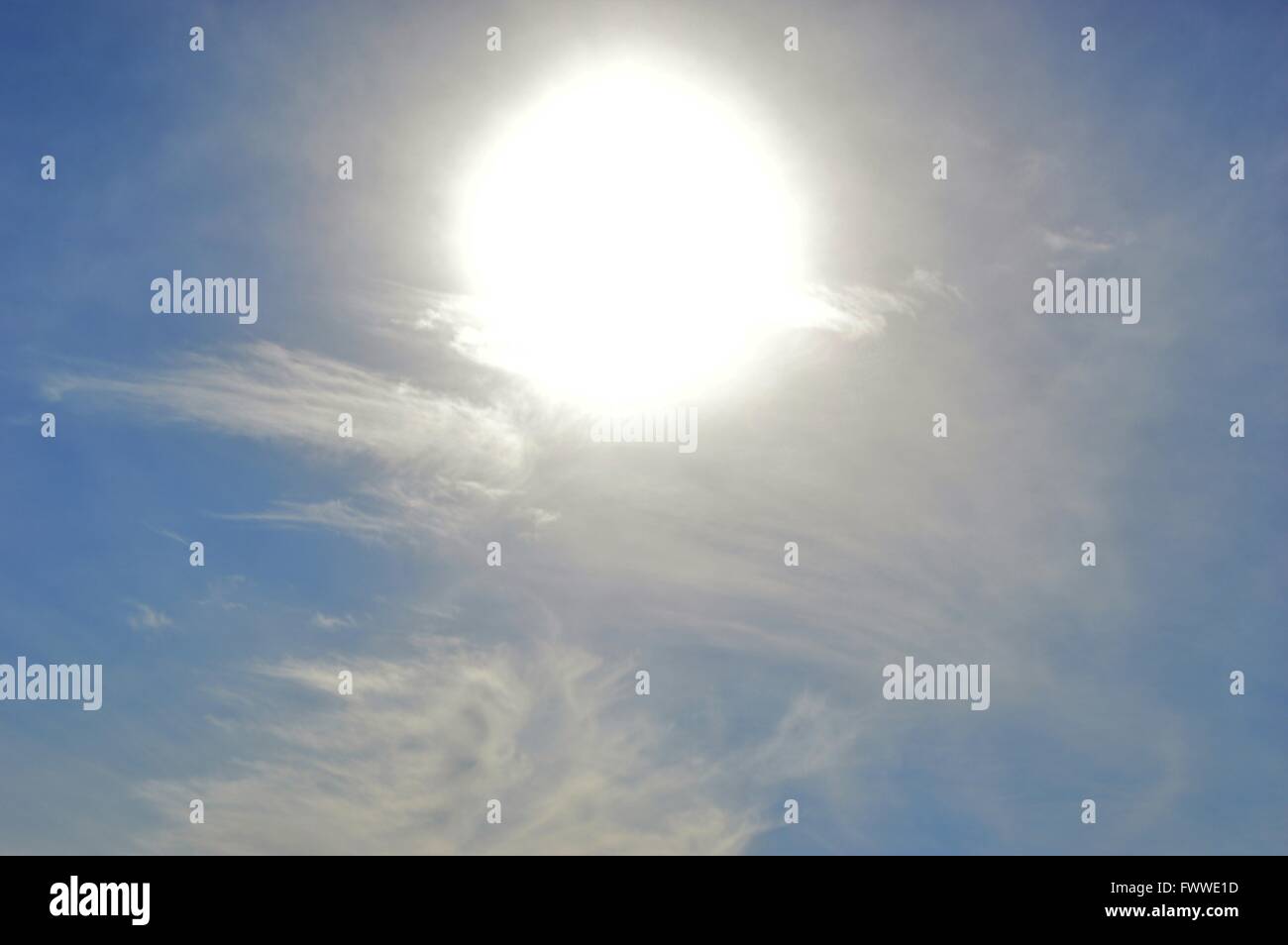 bright sun against a blue sky Stock Photo