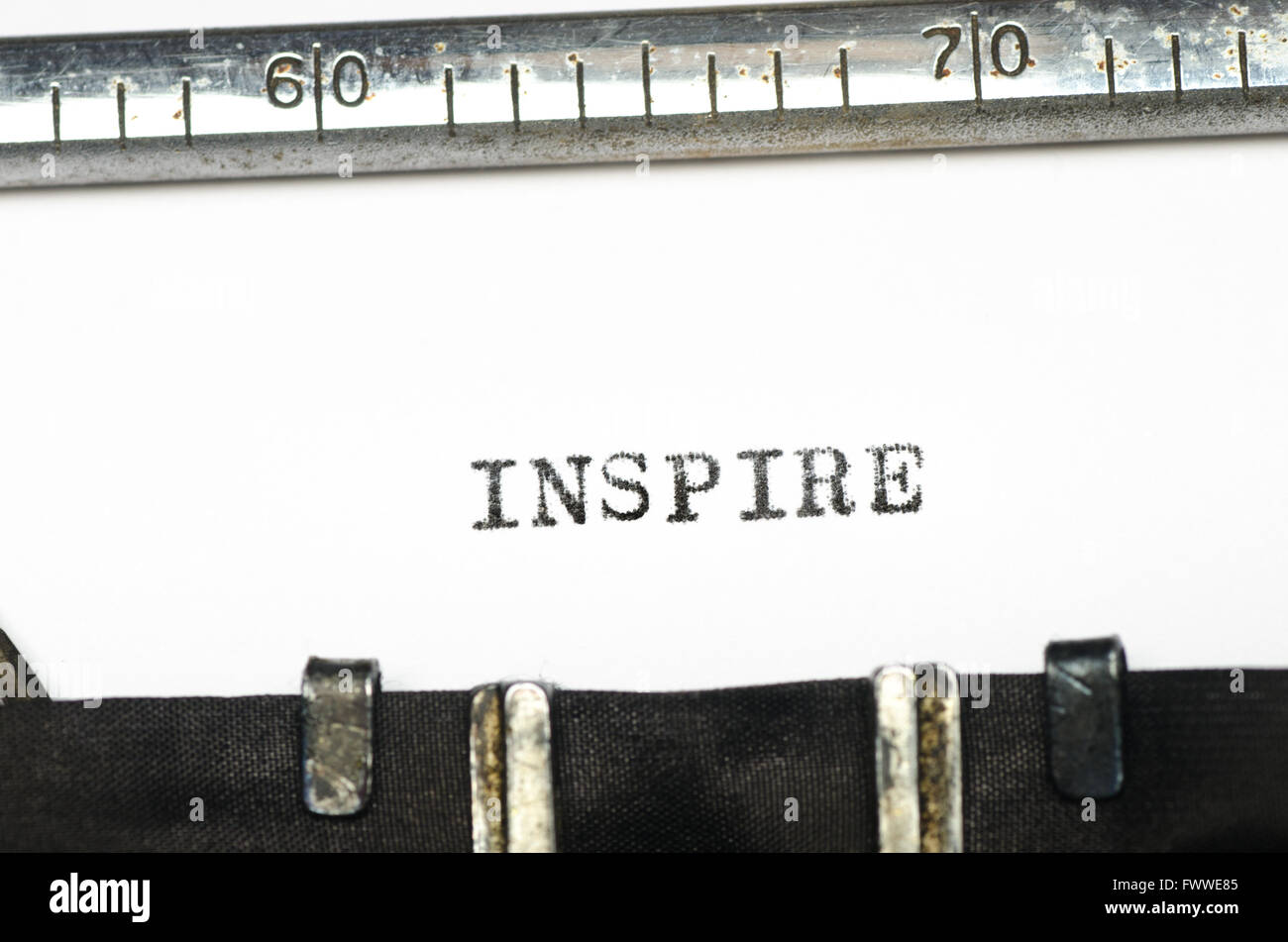 word inspire typed on old typewriter Stock Photo