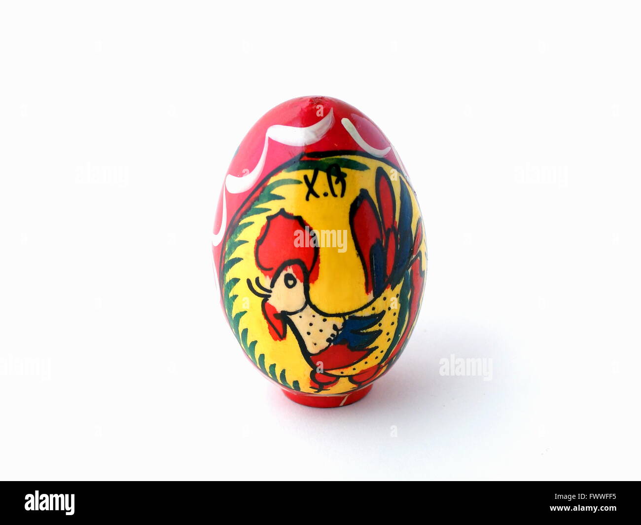 Decorated easter egg. Ancient wooden egg. Painting. Handmade. Stock Photo
