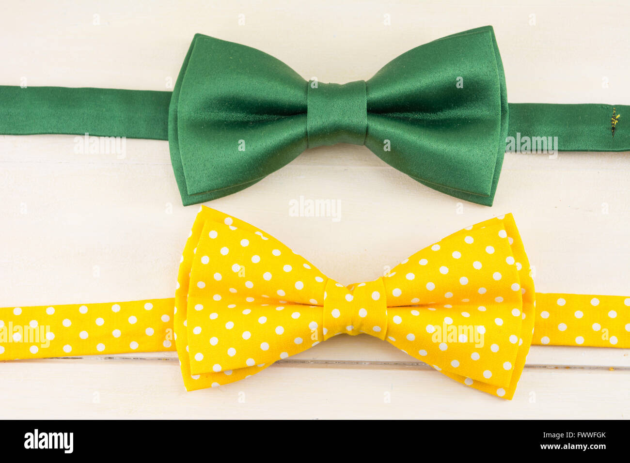 Bow ties on a wooden table Stock Photo