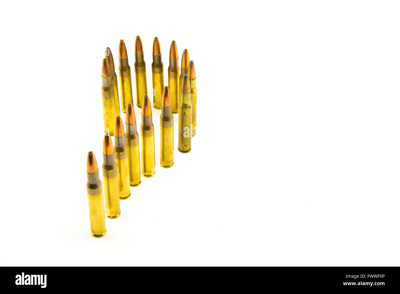 Composition with hollow-point ammunition for rifle on white background. Stock Photo