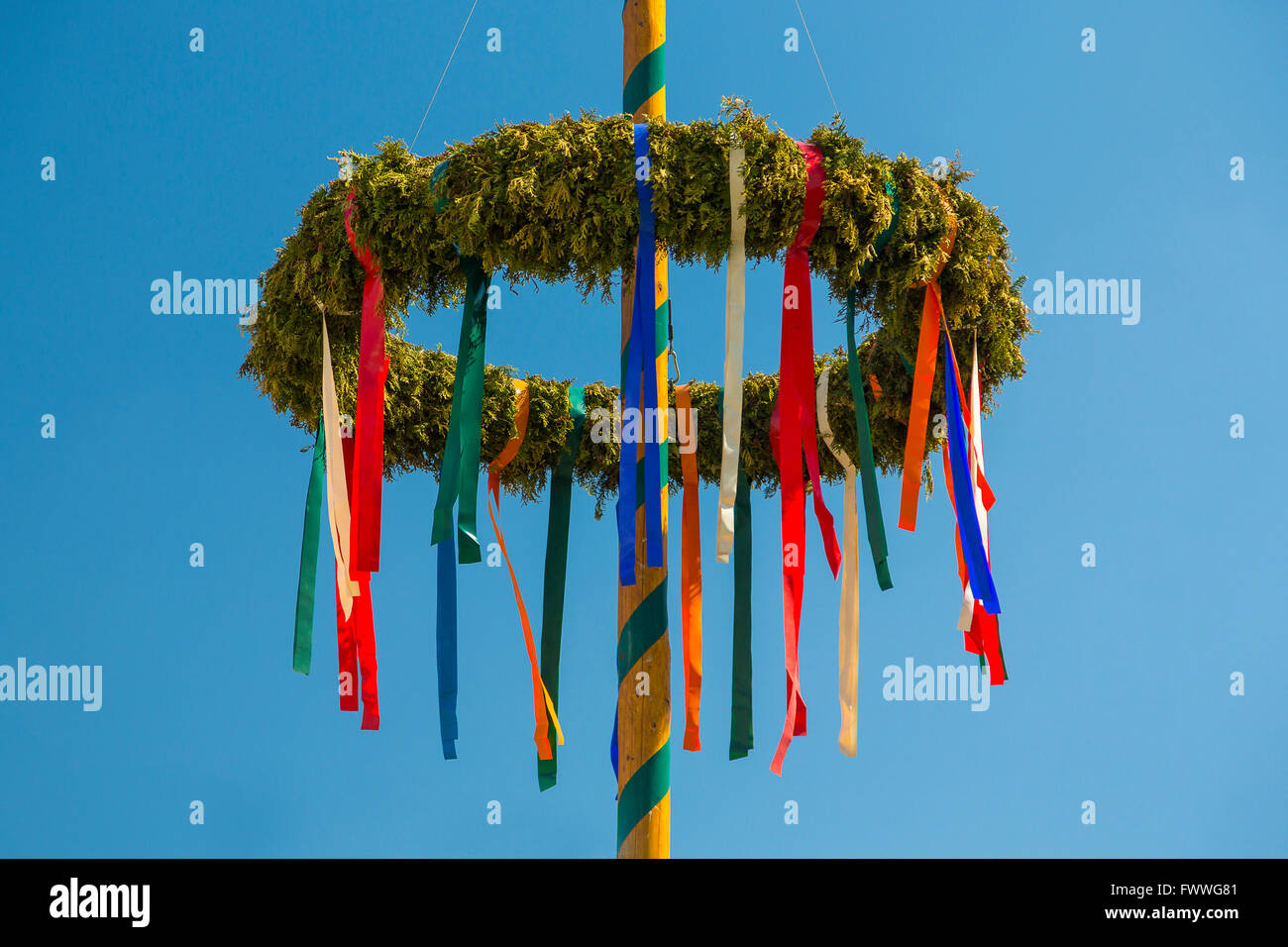 Maypole with colorful ribbons, Coswig-Kötitz, Saxony, Germany Stock Photo