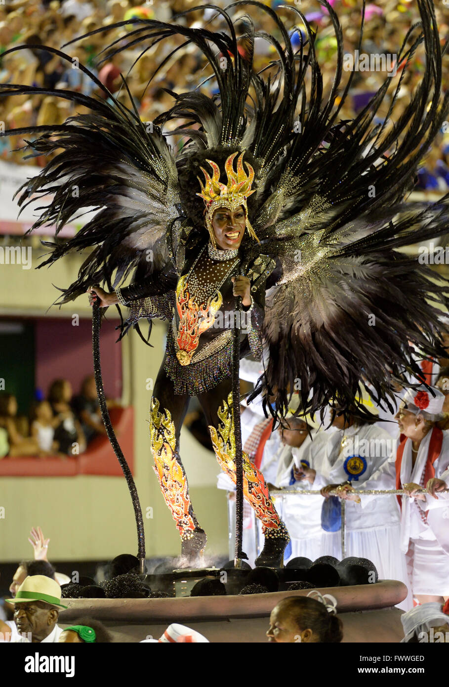 Samba Dancer on an allegorical float, dressed as a demon, parade of the