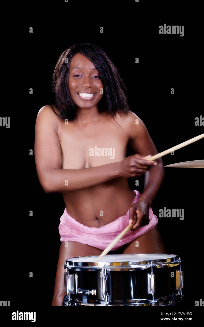 Smiling Black Woman Topless Playing Snare Drum Stock Photo