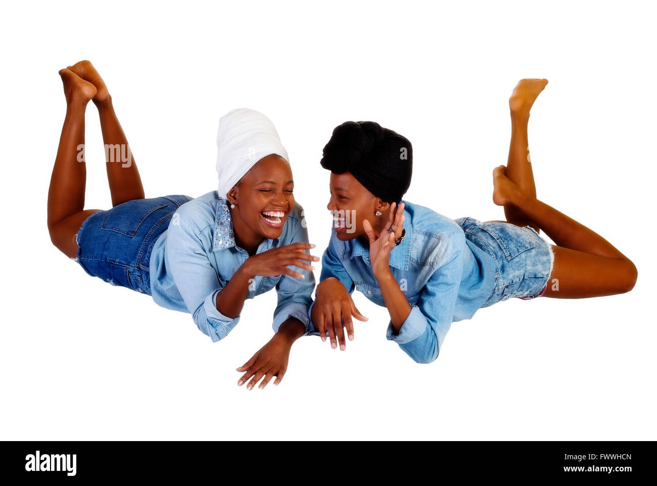 Two African American Women Laughing Shorts Shirts Head Scarves Stock Photo