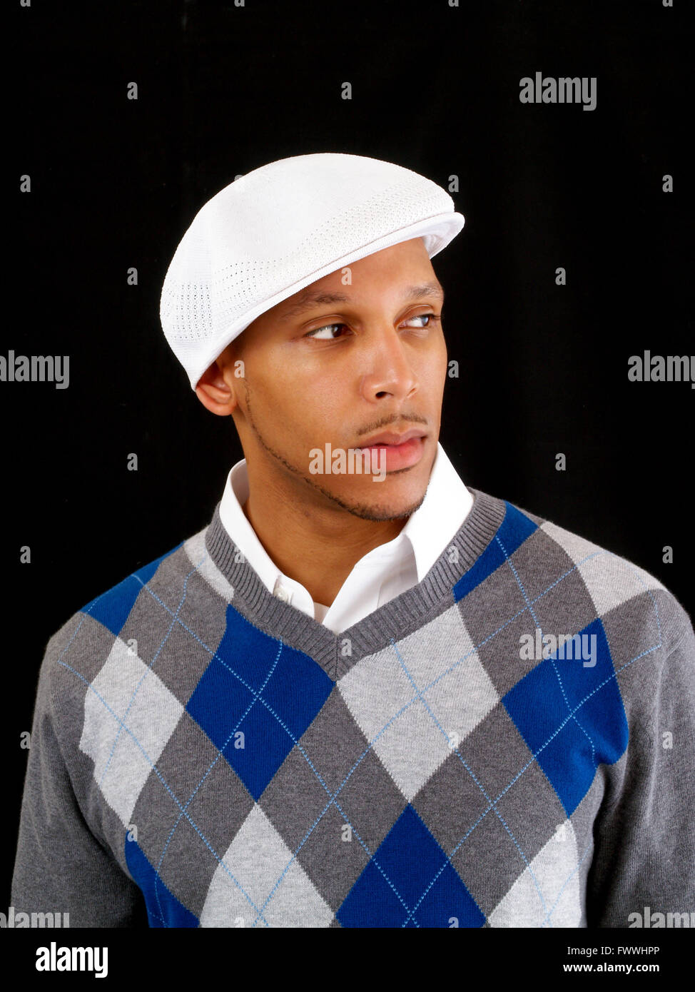 Man in black sweater and cap hi-res stock photography and images - Alamy