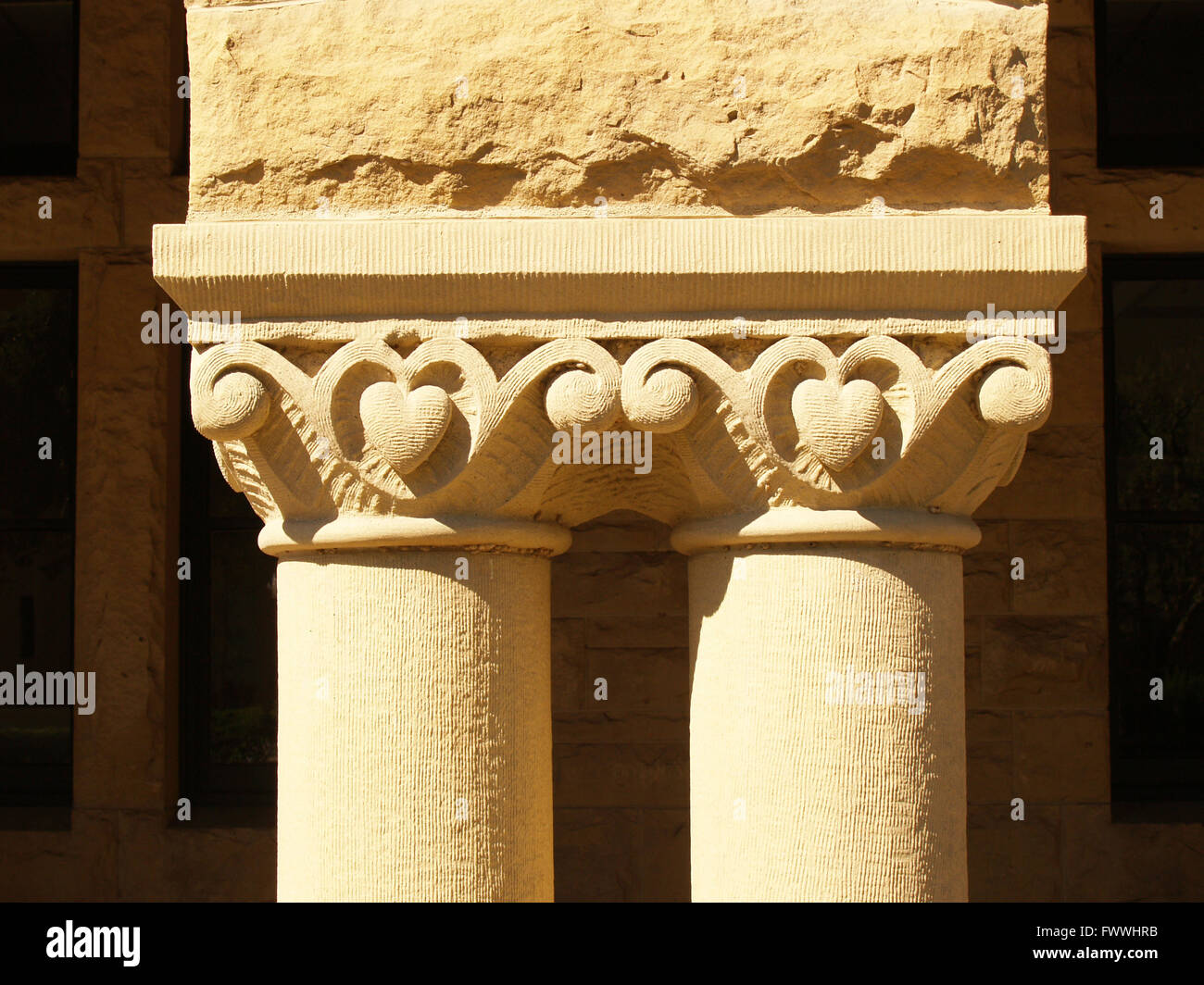 Two column supports with detail showing carvings and texture Stock Photo