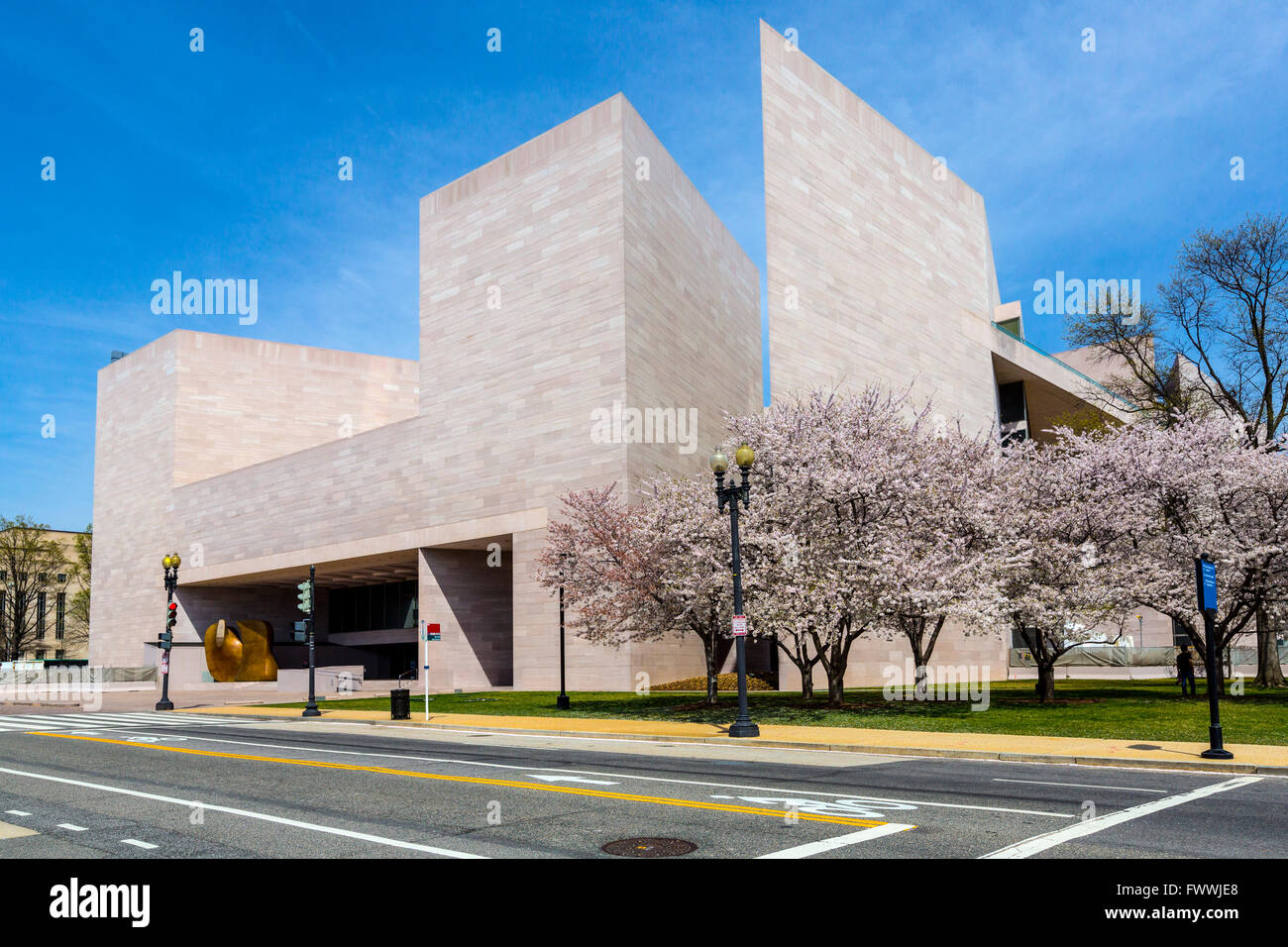 Washington, D.C.  Entrance, East Wing, National Gallery of Art, architect I. M. Pei.  Cherry Trees in Bloom. Stock Photo