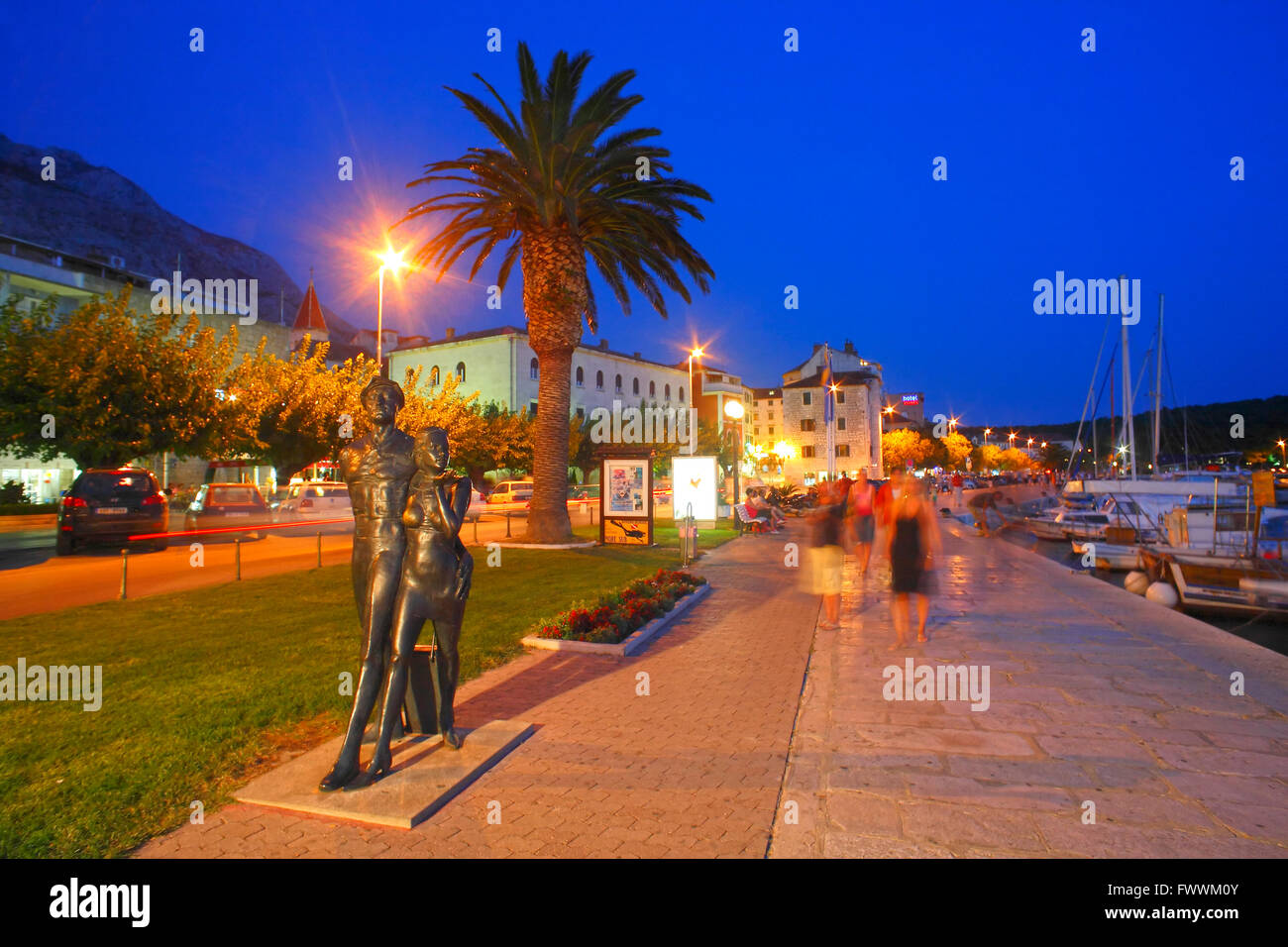 Promenade in Makarska town at night, Croatia Stock Photo