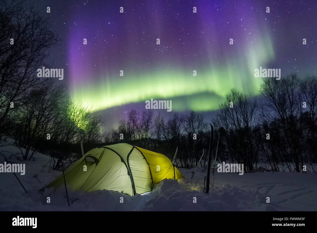 Tenting under the auroras Stock Photo
