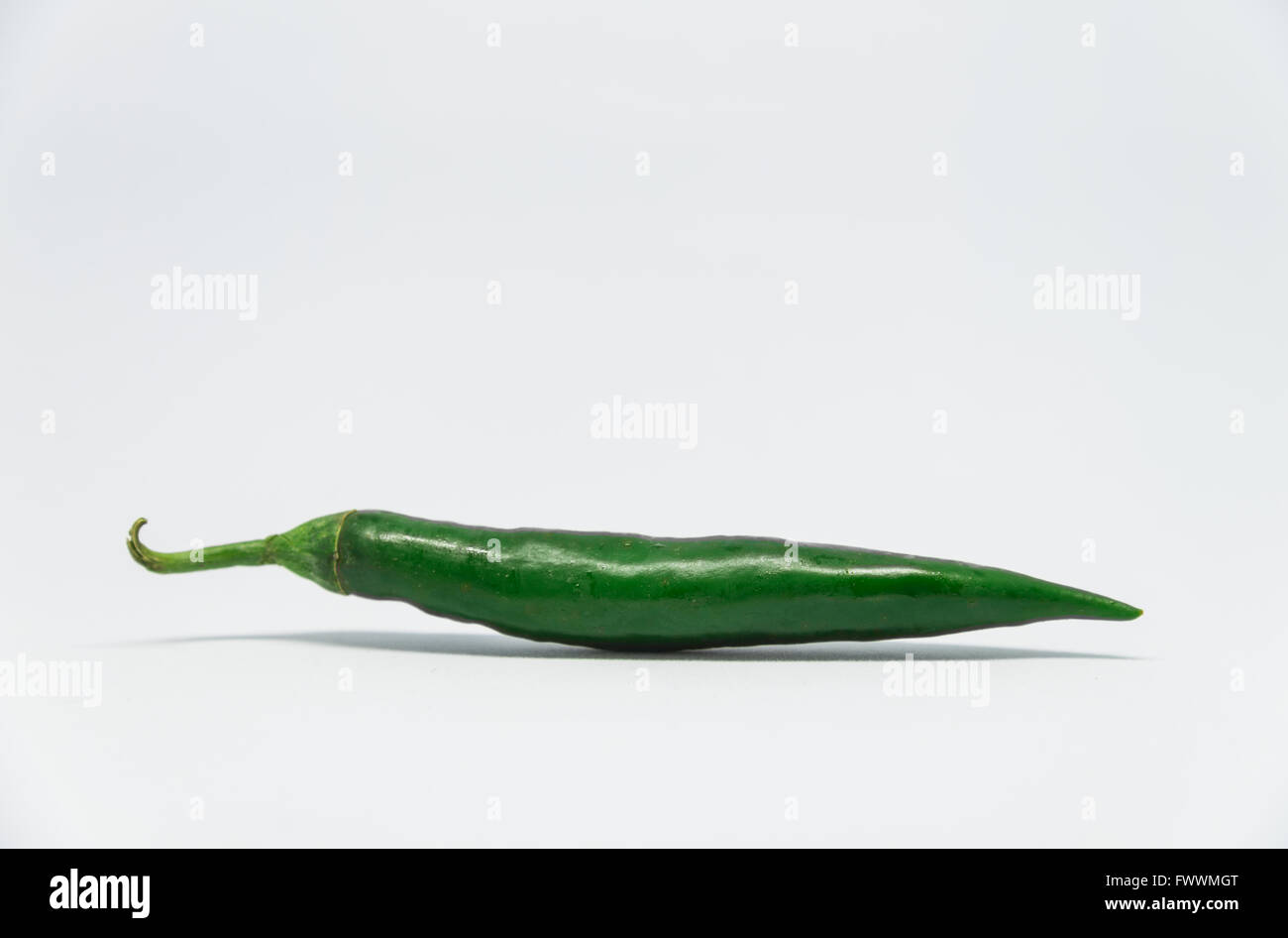 Fresh green chilli pepper with white background Stock Photo Alamy