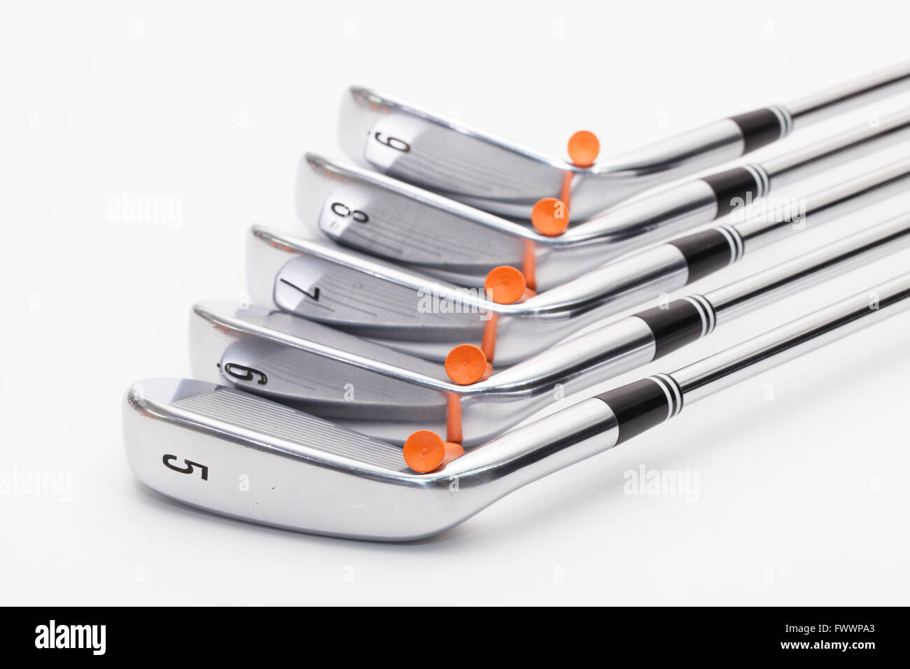 Titanium golf clubs on the white background Stock Photo Alamy