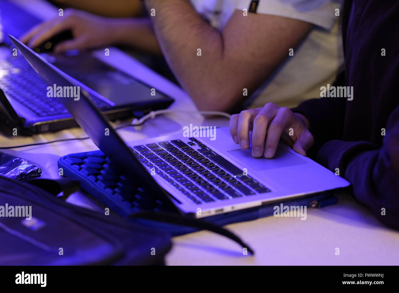 Jerusalem, Israel. 7th April, 2016. Young Israelis using laptop computers during Cyberknight Cyber Defense Challenge event in which teams compete against each other in stopping malicious hackers from invading vital infrastructures in a simulation game. Credit:  Eddie Gerald/Alamy Live News Stock Photo