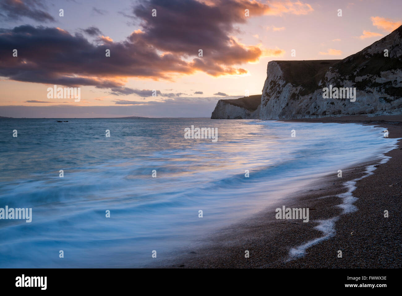 Bats Head, Lulworth, Dorset - 7th April 2016 - UK Weather - View of the cliffs of Bats Head and Swyre Head on Dorset's Jurassic Coast near Durdle Door at Sunset - Picture: Graham Hunt/Alamy Live News Stock Photo