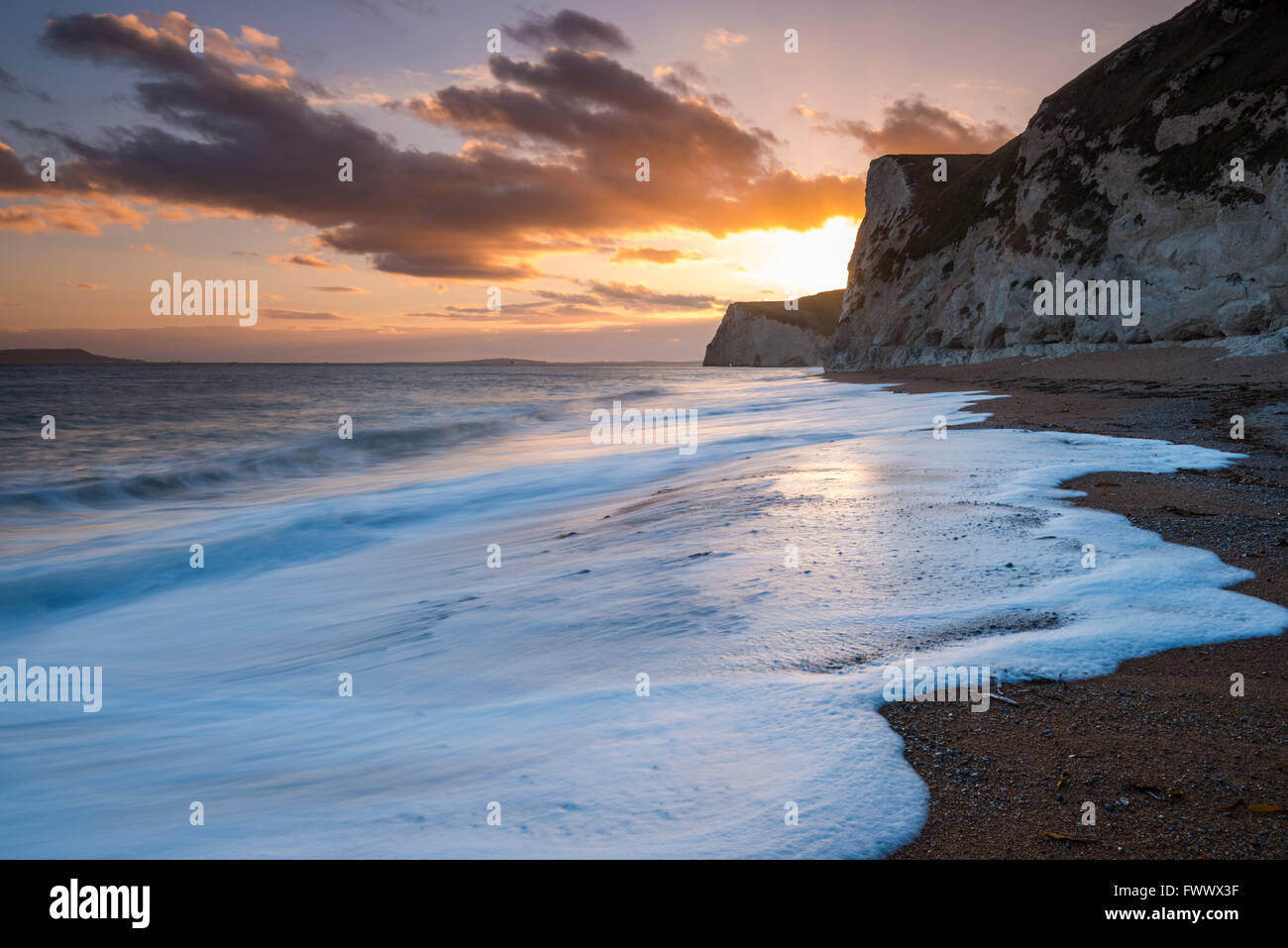 Bats Head, Lulworth, Dorset - 7th April 2016 - UK Weather - View of the cliffs of Bats Head and Swyre Head on Dorset's Jurassic Coast near Durdle Door at Sunset - Picture: Graham Hunt/Alamy Live News Stock Photo