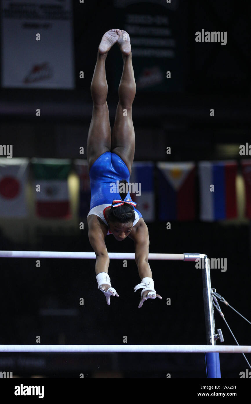 Everett, Washington, USA. 7th Apr, 2016. Gymnast Simone Biles trains on the uneven parallel bars