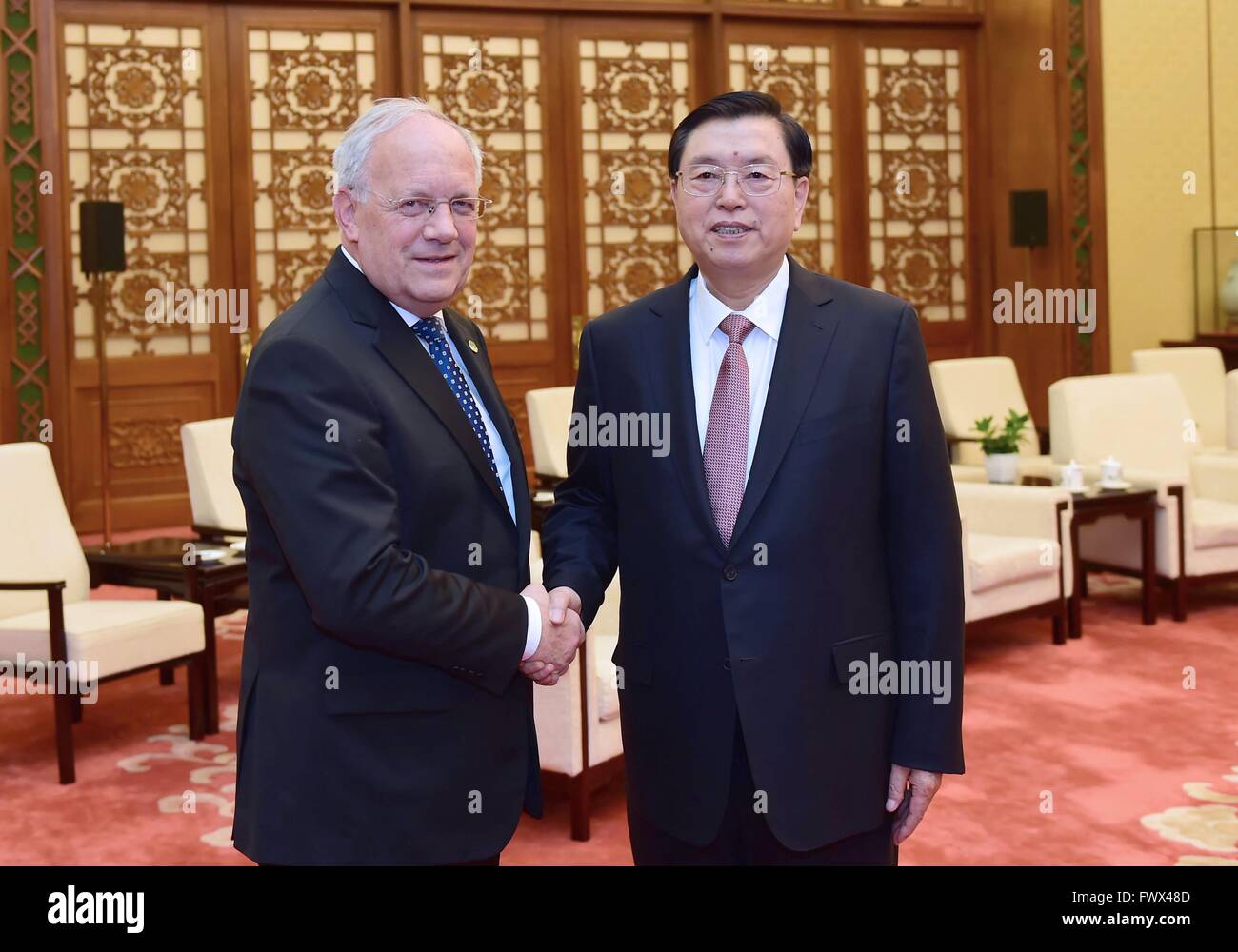 Beijing, China. 8th Apr, 2016. Zhang Dejiang (R), chairman of the Standing Committee of China's National People's Congress, meets with Swiss President Johann Schneider-Ammann in Beijing, China, April 8, 2016. Credit:  Zhang Duo/Xinhua/Alamy Live News Stock Photo