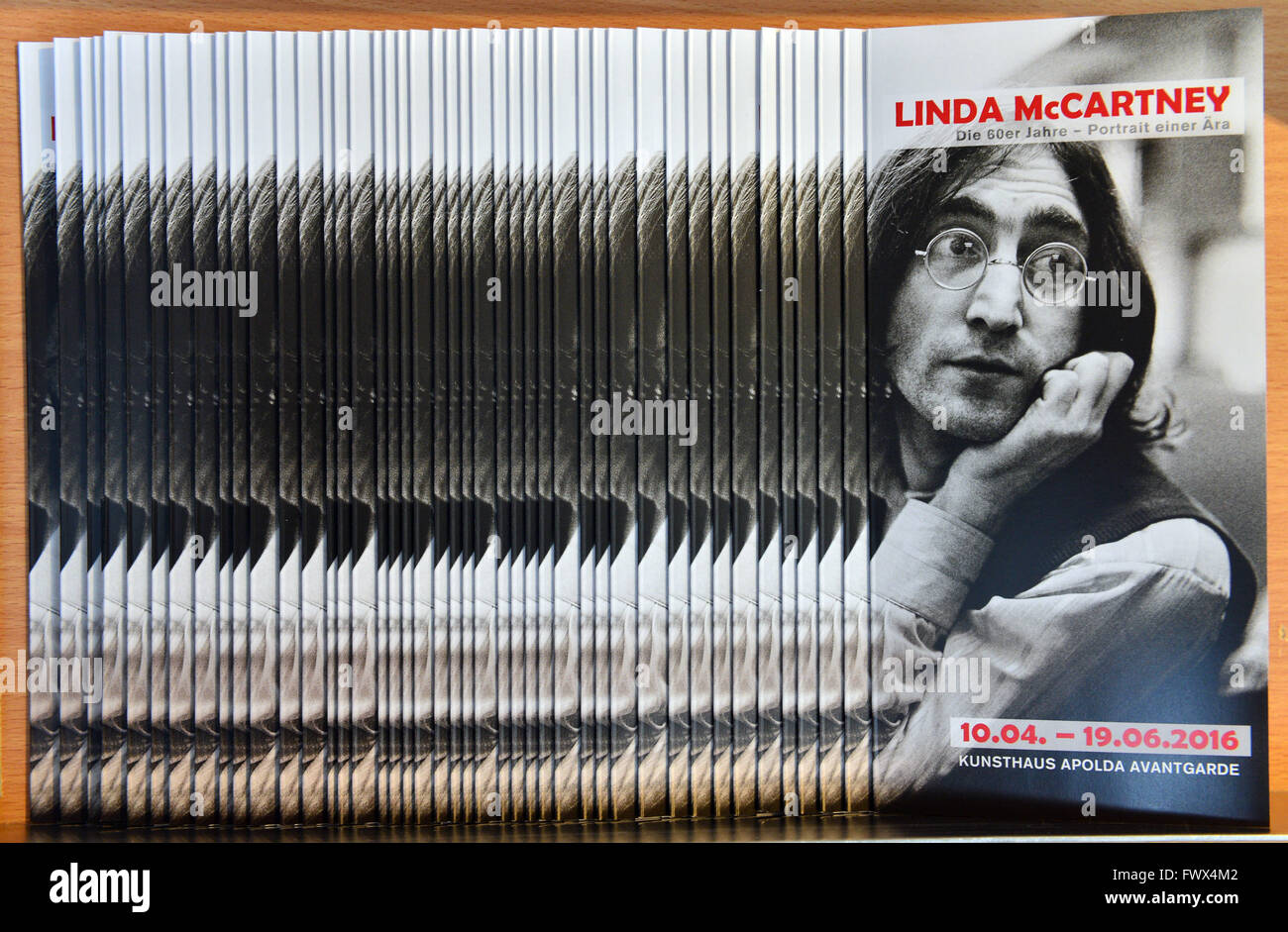 Apolda, Germany. 08th Apr, 2016. Flyers promote the exhibition of photos by Linda McCartney in the Kunsthaus Apolda in Apolda, Germany, 08 April 2016. The new exhibition 'Linda McCartneym - The 1960s - Portraits of an Era' can be seen from 10 April until 19 June 2016. On display are around 160 pictures taked by the photographer, the wife of former Beatle Paul McCartney, who died in 1998. Photo: MARTIN SCHUTT/dpa/Alamy Live News Stock Photo