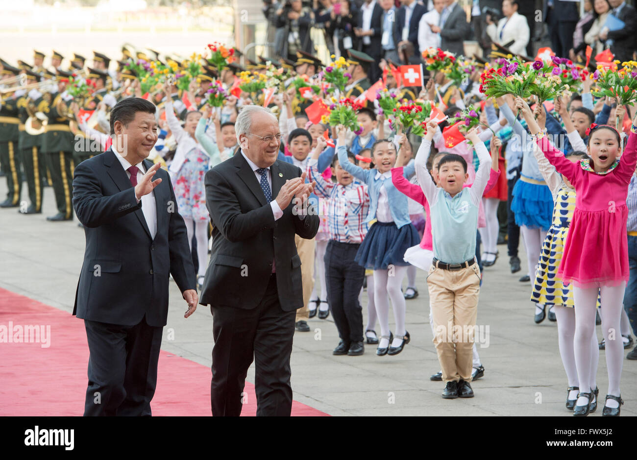 Beijing, China. 8th Apr, 2016. Chinese President Xi Jinping (L, front) holds a welcoming ceremony for Swiss President Johann Schneider-Ammann before their talks in Beijing, China, April 8, 2016. Credit:  Li Xueren/Xinhua/Alamy Live News Stock Photo