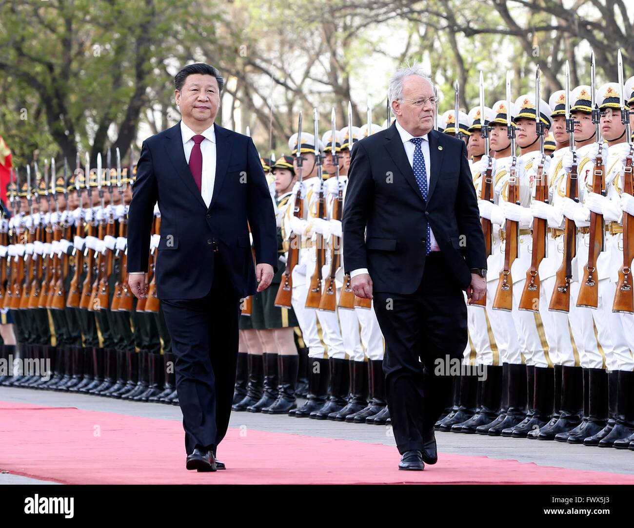Beijing, China. 8th Apr, 2016. Chinese President Xi Jinping (L) holds a welcoming ceremony for Swiss President Johann Schneider-Ammann before their talks in Beijing, China, April 8, 2016. Credit:  Ding Lin/Xinhua/Alamy Live News Stock Photo