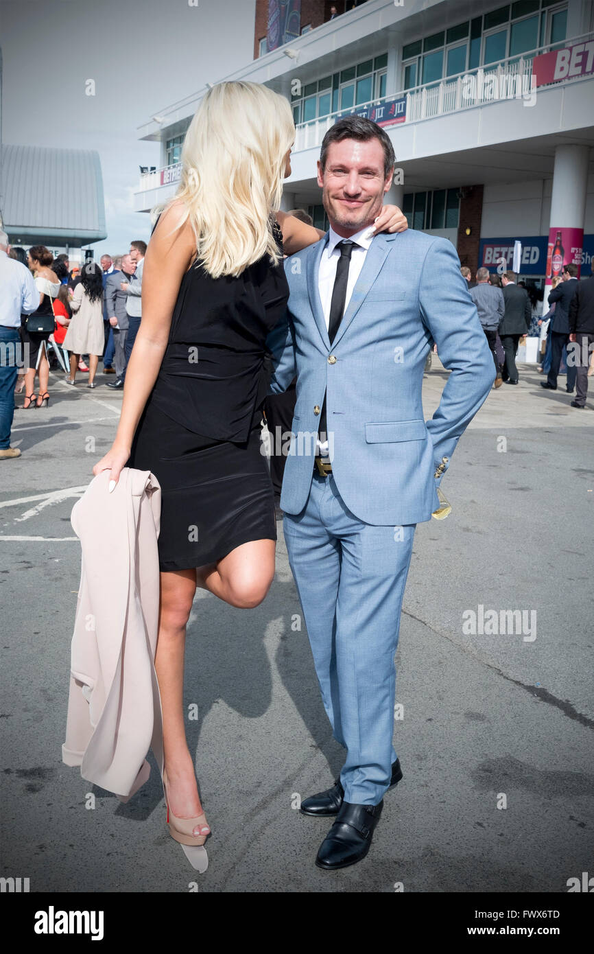 Liverpool, Merseyside, UK 8th April, 2016.   Actor Dean Gaffney attends the 'Ladies Day' at Aintree racecourse with his girlfriend. Credit:  Cernan Elias/Alamy Live News Stock Photo