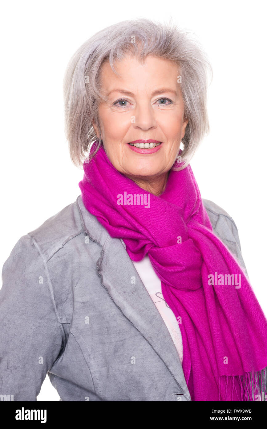 Portrait from a smiling senior woman in front of white background Stock ...
