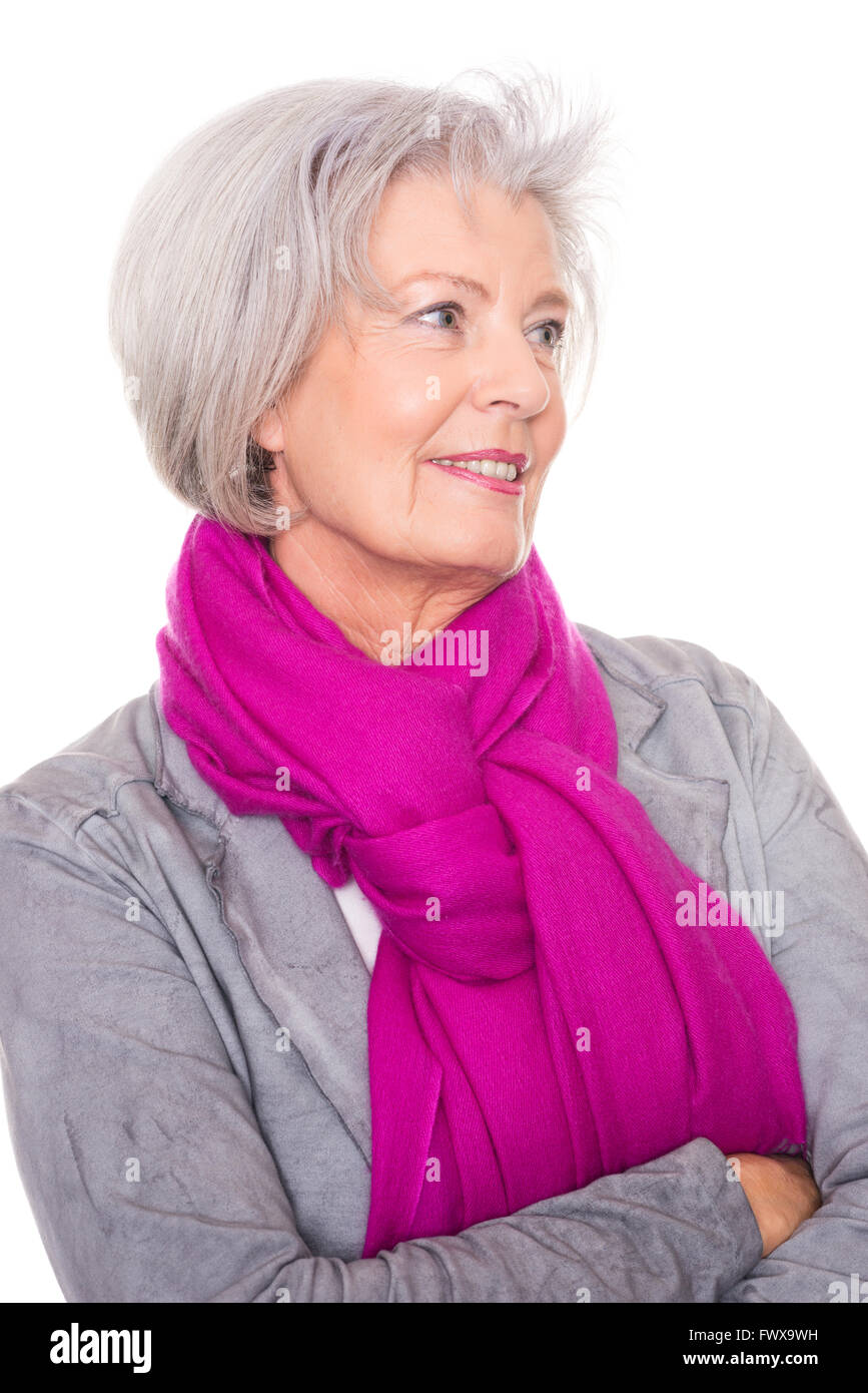 Portrait from a smiling senior woman in front of white background Stock ...