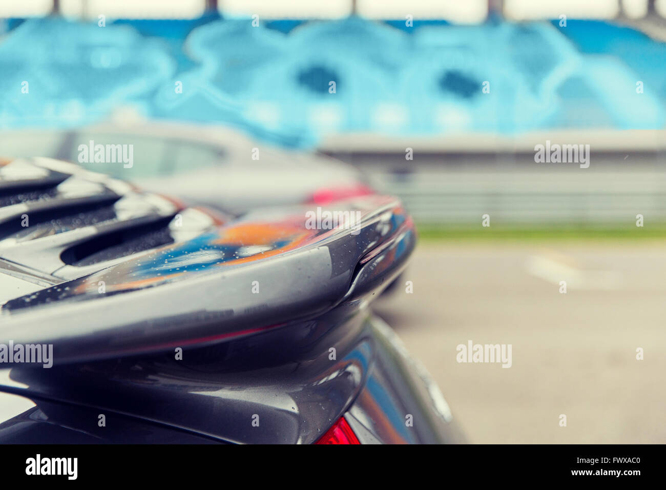 close up of car spoiler on speedway at stadium Stock Photo