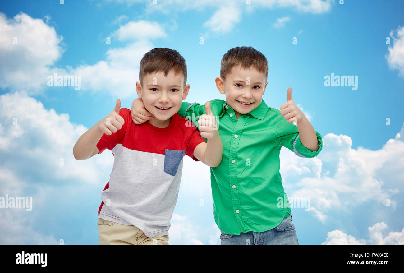 happy smiling little boys showing thumbs up Stock Photo - Alamy