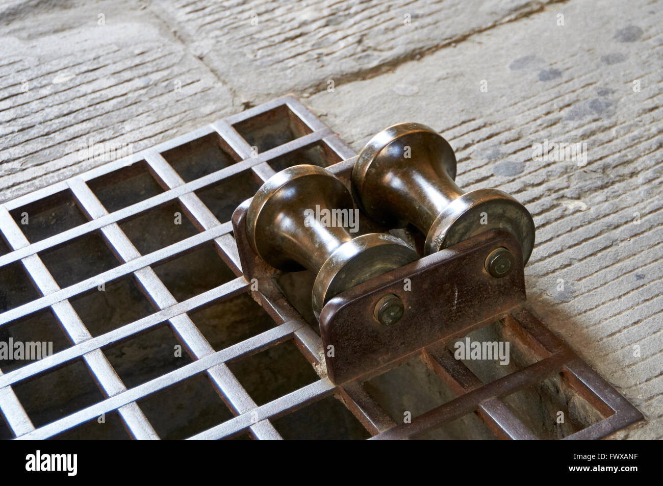 A Bell rope  roller guide on one of the levels  in Giottos Bell Tower Florence. Stock Photo