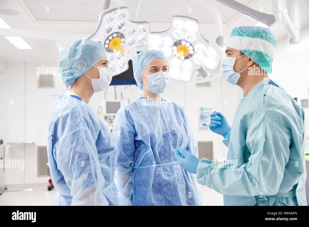 group of surgeons in operating room at hospital Stock Photo - Alamy