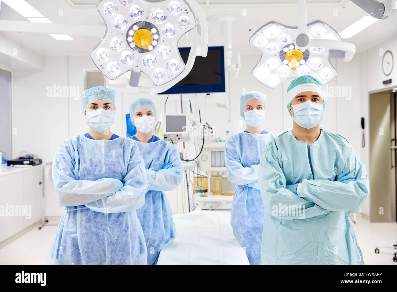 group of surgeons in operating room at hospital Stock Photo - Alamy